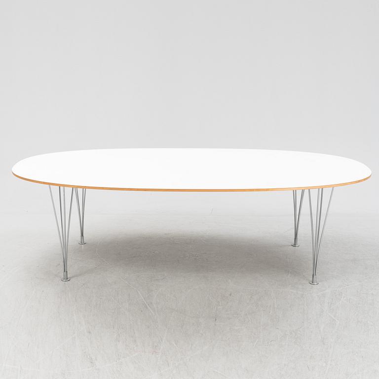 A Super ellpitical dining table, by Bruno Mathsson and Piet Hein for Fritz Hansen dated 2008.