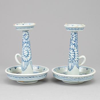 A pair of blue and white candle holders, Qing dynasty, late 19th century.