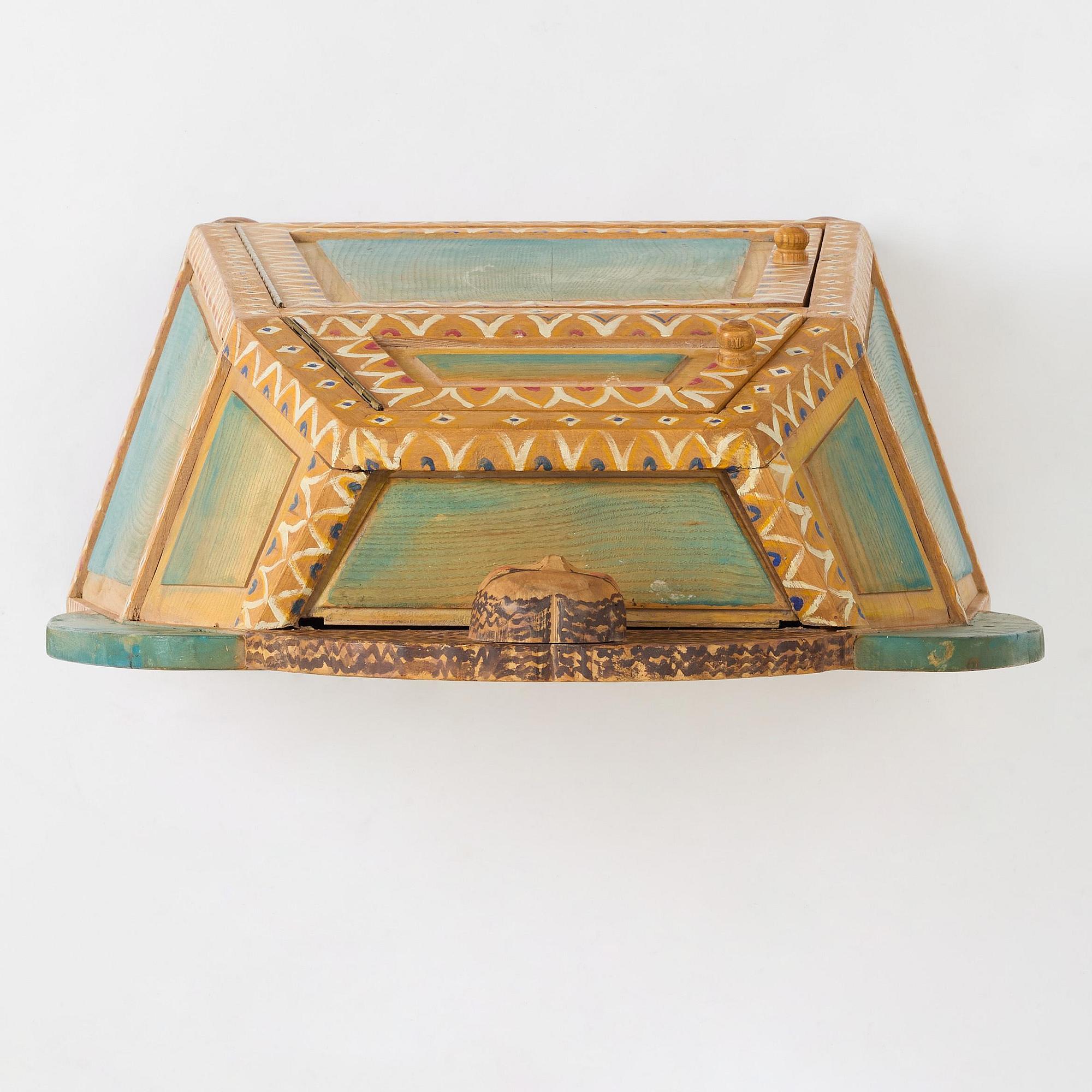 Gérard Rigot, a painted and carved oak cabinet, exectued in his studio, France, second half of the 20th century.