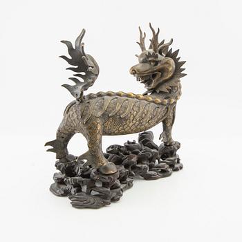 Dragon with stand, late Qing/early 20th century, bronze.