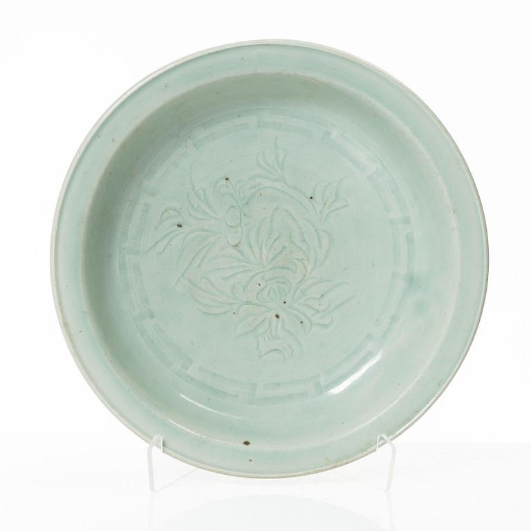 A Chinese celadon dish, Ming dynasty (1368-1644).