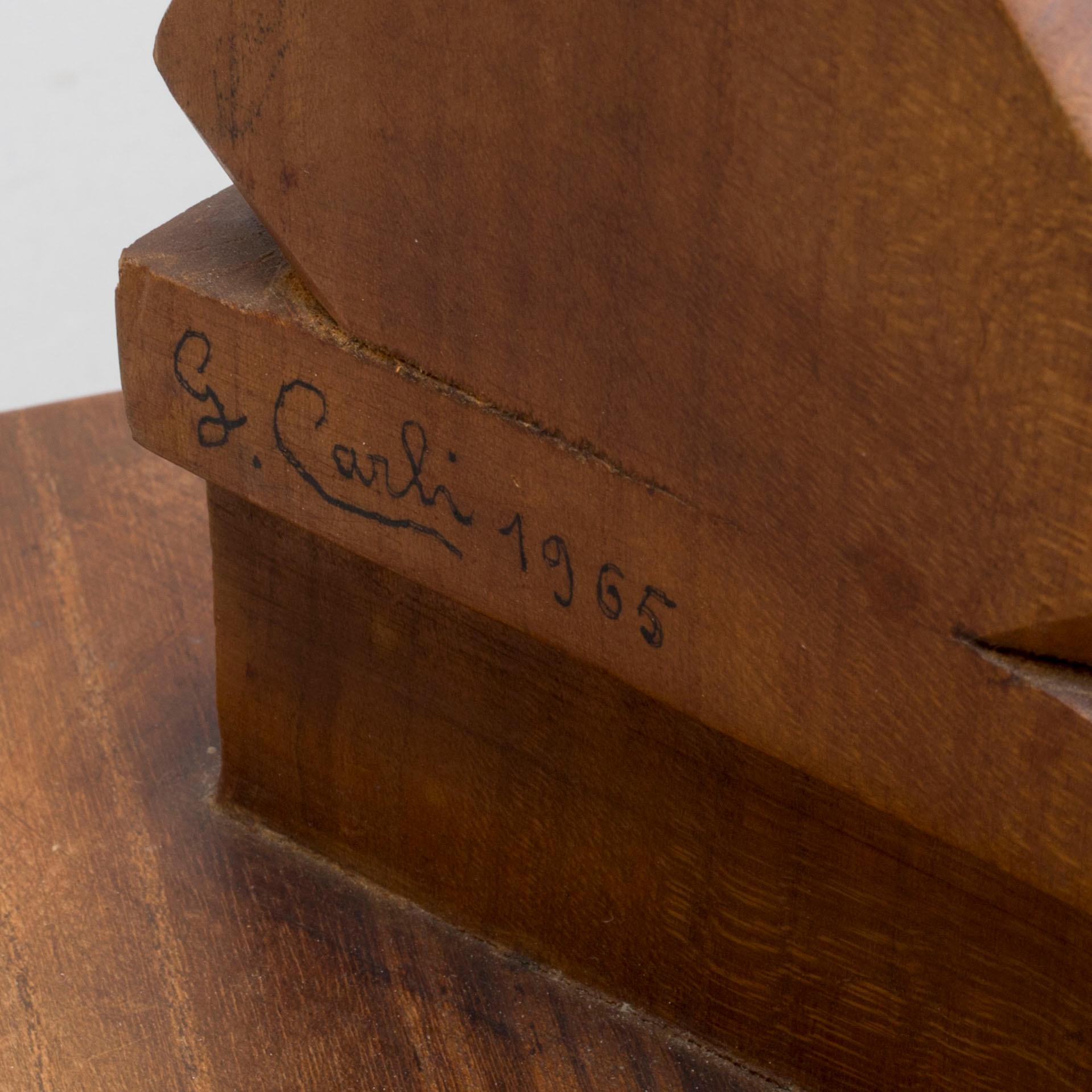 GIUSEPPE CARLI, a signed and dated venetian walnut forcola, rowlock, 1965.