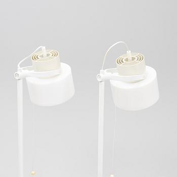 A pair of whithe floor lights, Luxus, Vittsjö.