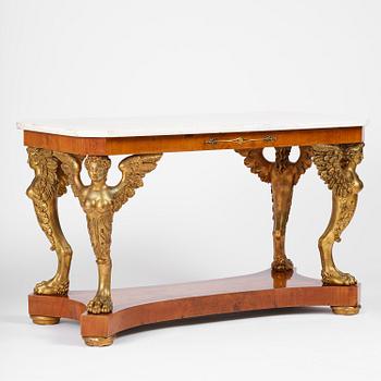 A presumably Austrian Empire centre table, early 19th century.