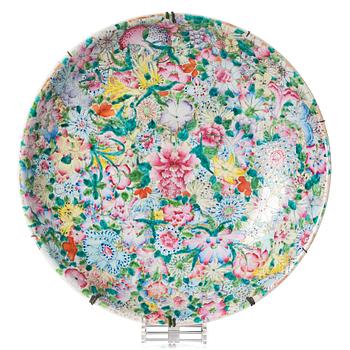 1112. A massive Chinese famille rose 'mille fleur' dish, 20th Century.