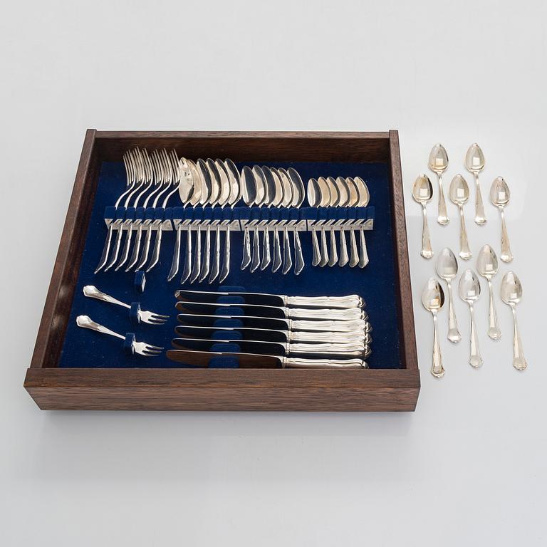 A 47-piece set of 'Chippendale' silver cutlery and a pair of silver candlesticks, Finnish marks 1983-2003 and 1976.