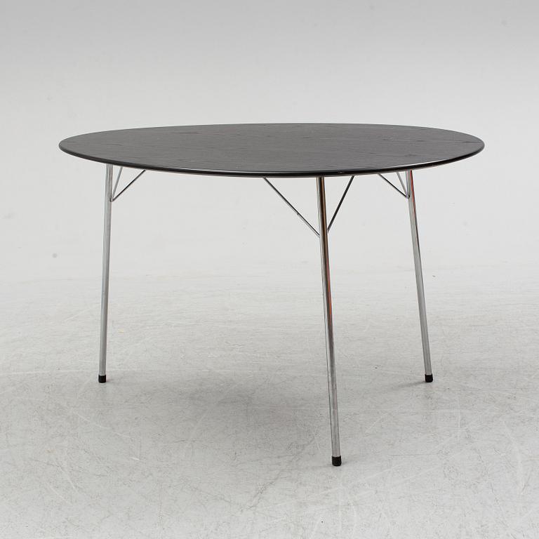 An Arne Jacobsen "Centenary Package" comprising three "Ant Chairs" and an eggshaped table, Fritz Hansen, Denmark.