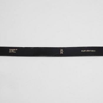 GUCCI and CHANEL, three leather belts.