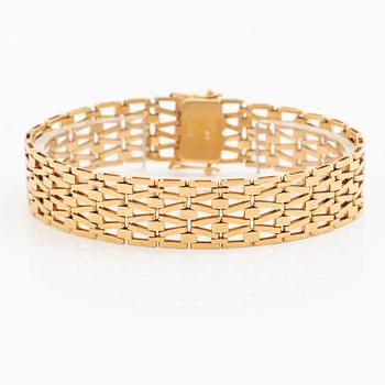 Arm bracelet, 18K gold.