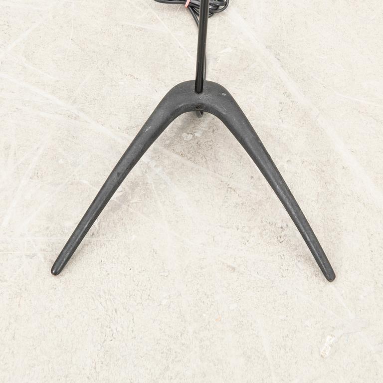 A metal floor lamp from the later part of the 20th century.