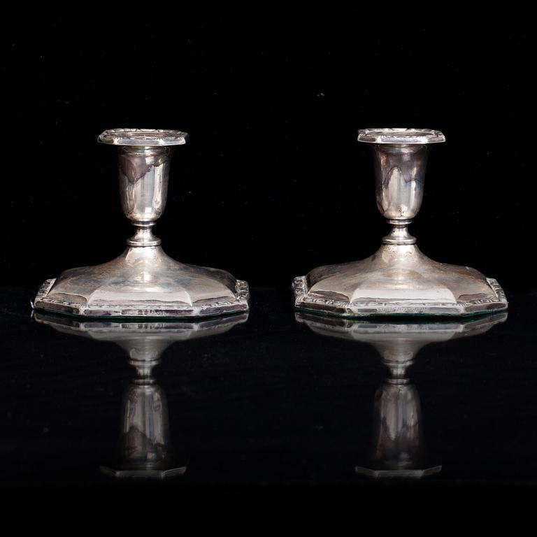 LJUSSTAKAR, ett par, silver. 1900-talets första hälft.