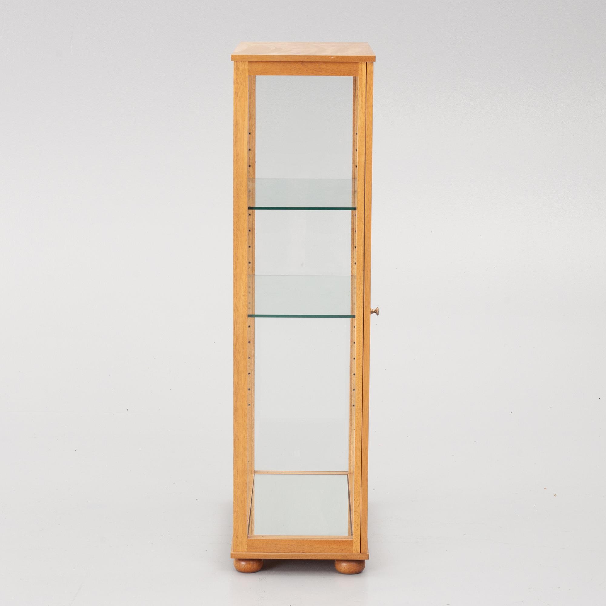Josef Frank, a display cabinet, model 649, Svenskt Tenn, post 1985.