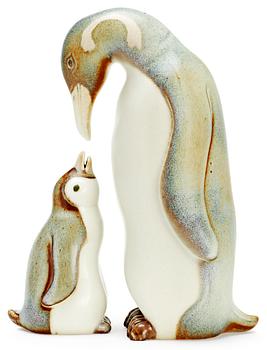 Two Gunnar Nylund stoneware figures depicting a penguin mother and child, Rörstrand.