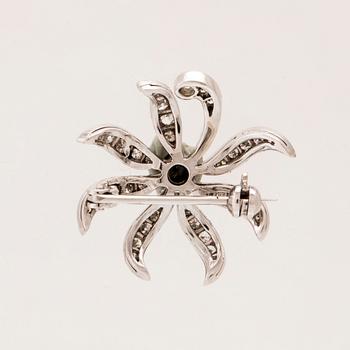 Brooch 18K white gold and various cut diamonds.