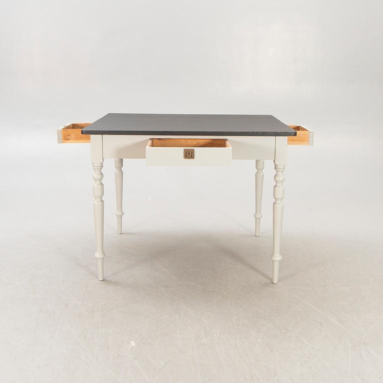 A painted working table later part of the 19th century.