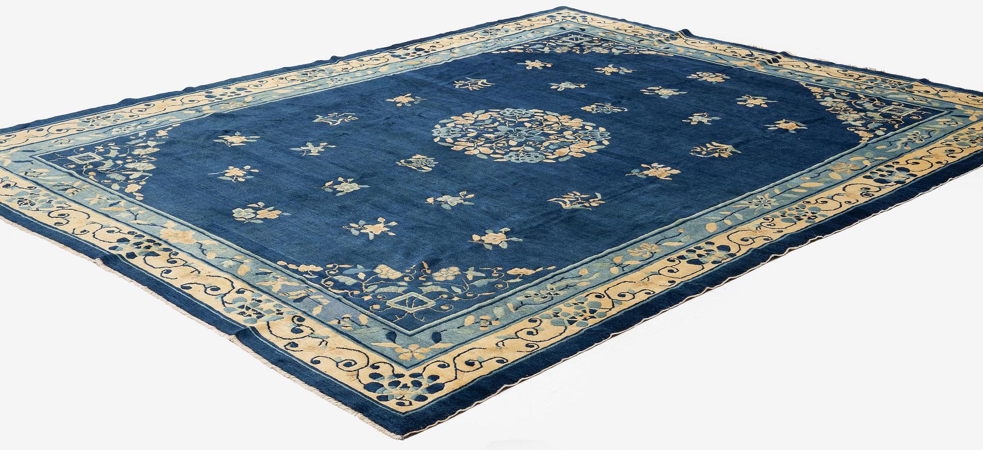 An antique Peking (Beijing) carpet, North China, c. 340 x 275 cm.