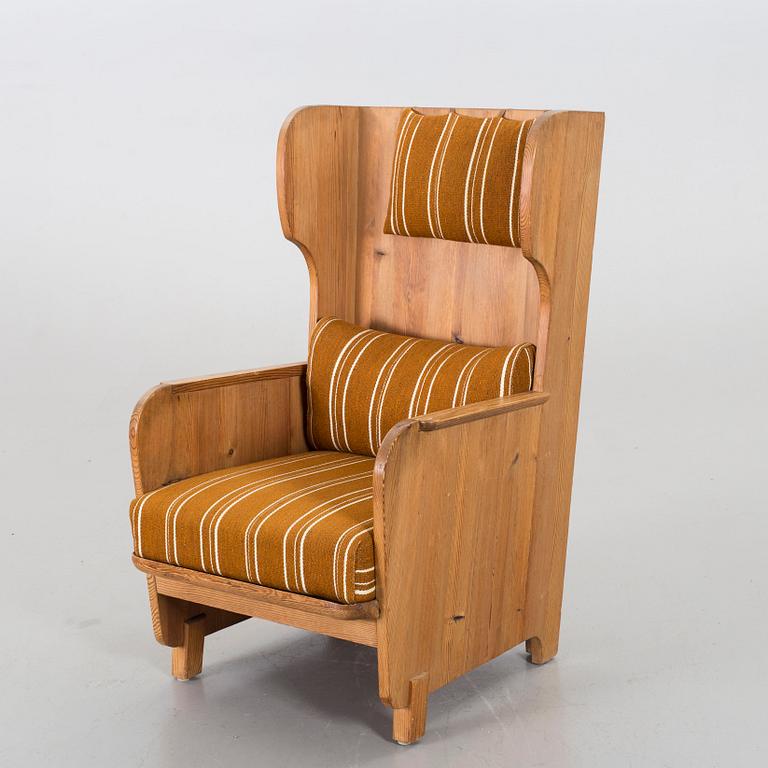 Axel Einar Hjorth, a "Lovö" stained pine armchair, Nordiska Kompaniet, Sweden, 1930's.