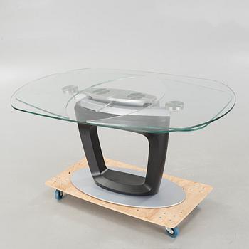 A 21st century "Orbital" dinner table by Pininfarina for Calligaris.
