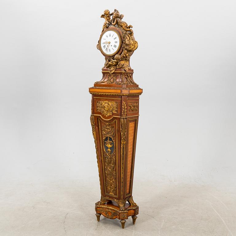 A louis XV style long case clock later part of the 19th century.