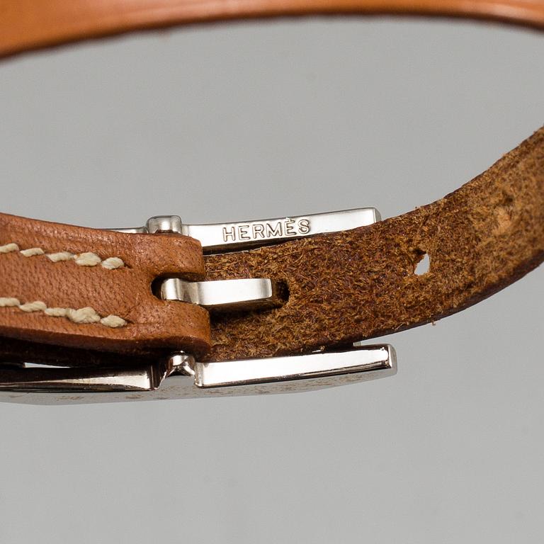 HERMÈS, a scarf and a bracelet.