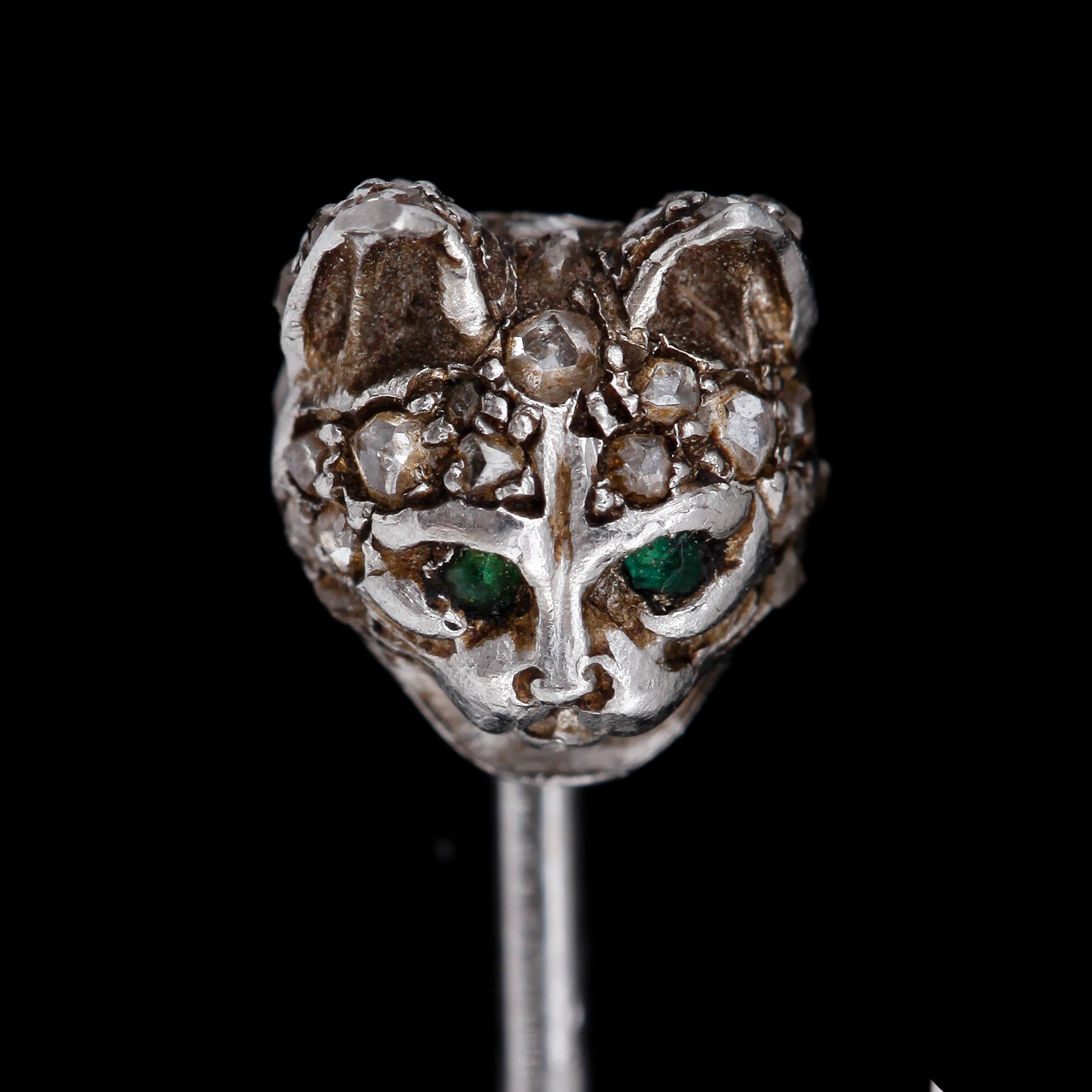 Cartier, A Cartier rose cut diamond and emerald tie pin.