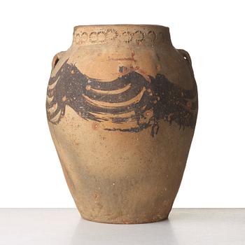 A large teracotta wine jar, Medeterranian area.