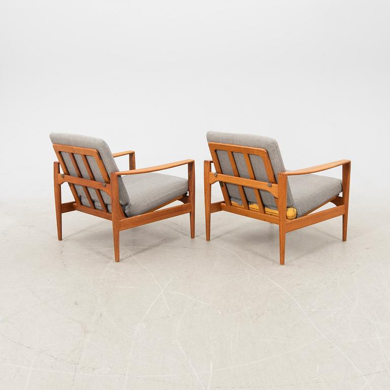 A pair of teak easy chairs, Denmark middle fo the 20th century.
