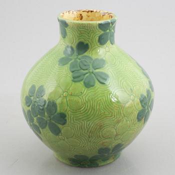 Gunnar Wennerberg, a 'Sgrafitto' creamware vase from Gustavsberg, dated 1907.