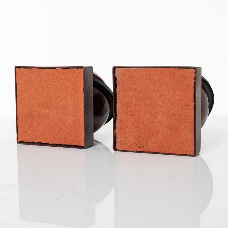 A pair of 'Saturnus' candleholders, 1930s.