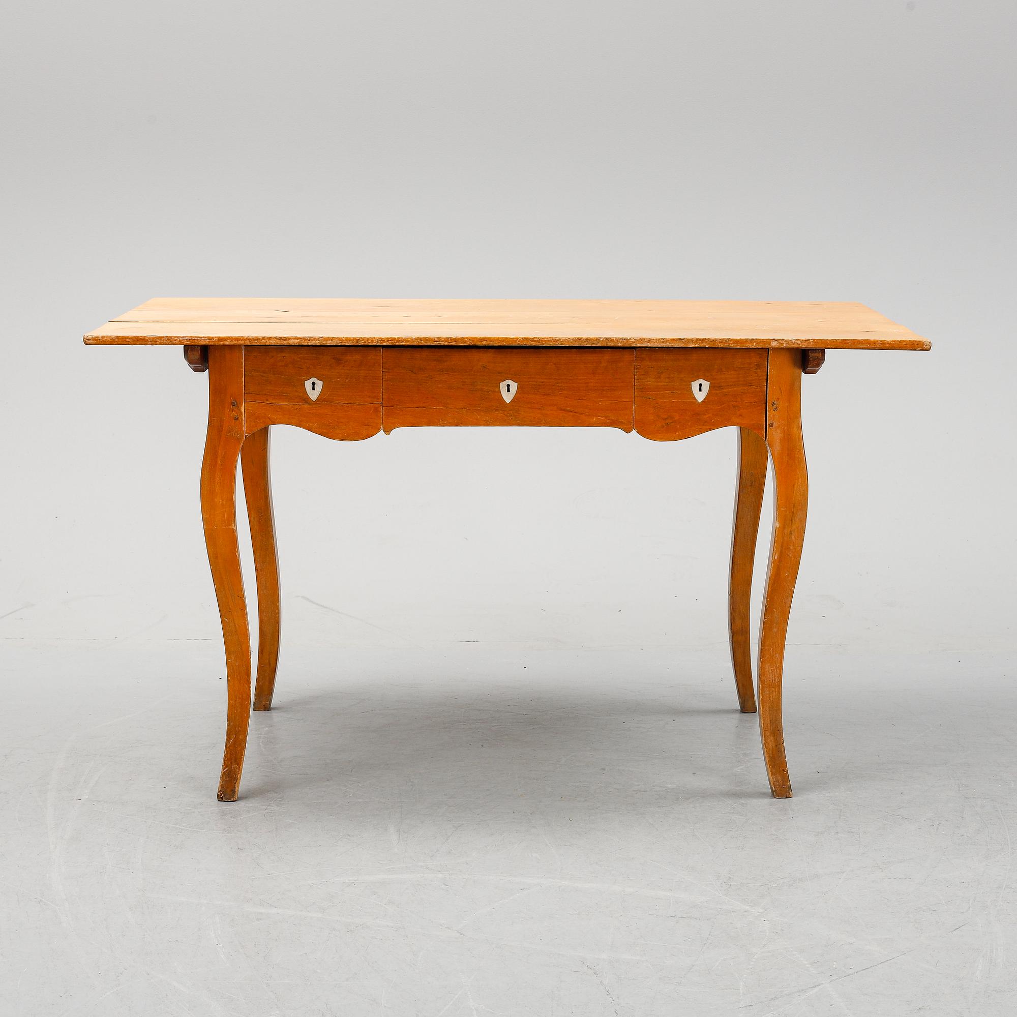 A birch Rococo style desk, second half of the 19th Century.