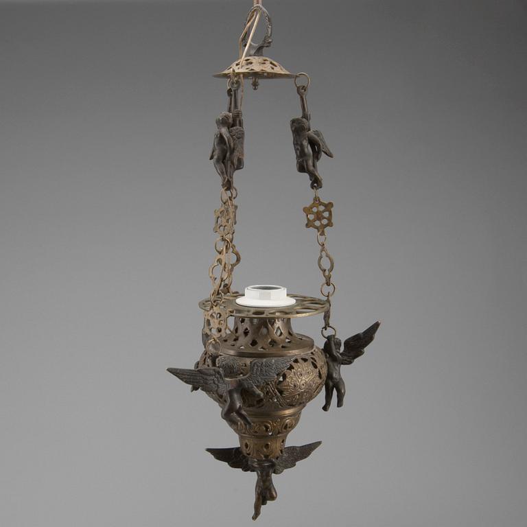 TAKAMPEL, metall, 1900-tal. Höjd ca 60 cm.