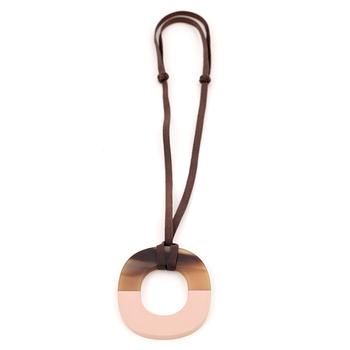 HERMÈS, a pendant in buffalo horn and brick lacquered wood with waxed cotton cord, "Isthme".