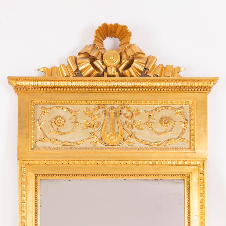 A late-Gustavian giltwood mirror, Stockholm, late 18th century.