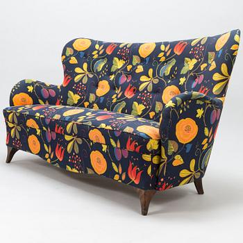 A mid-20th century sofa.