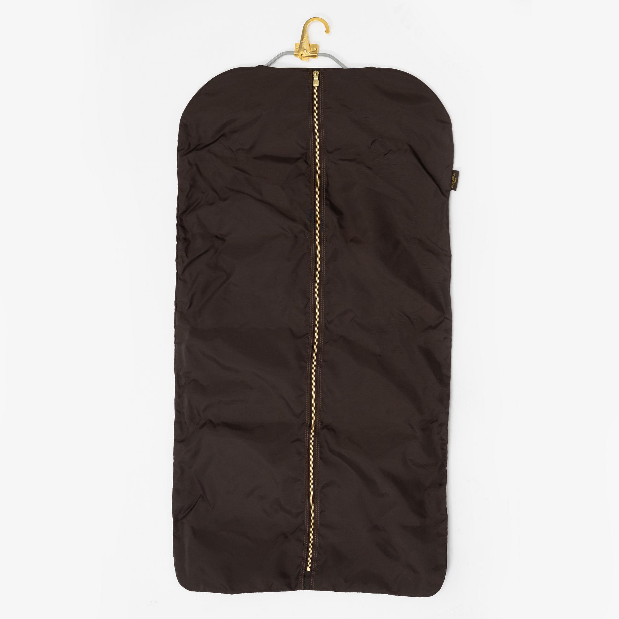 A monogram printed leather "Pegase 45" cabin bag by Louis Vuitton.