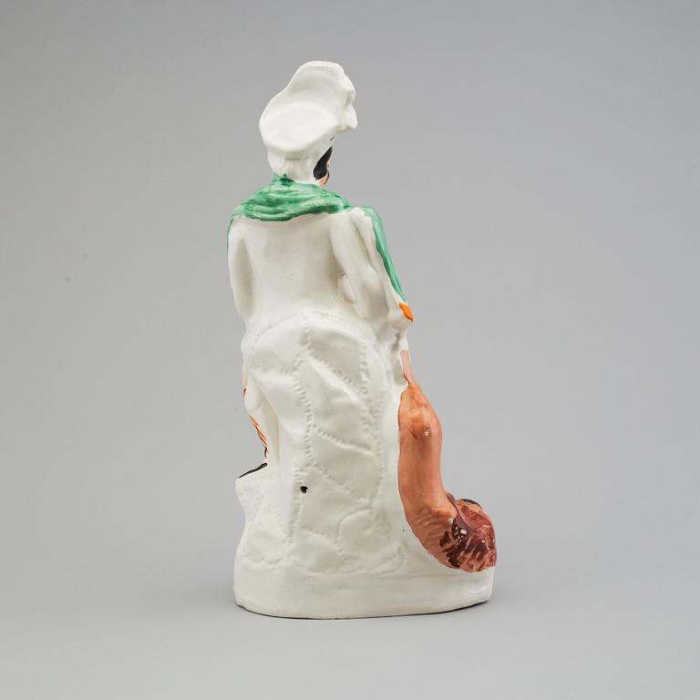 An earthenware figure of 'The Lion Slayer'. England, Staffordshire, 1860/70s.