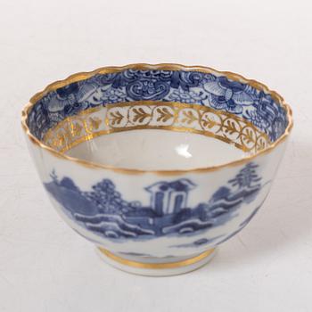 A group  of three serving dishes, a serving bowl, a cup, and seven plates, porcelain, including China 18th century.