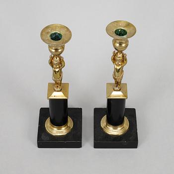 A pair of late gustavian candlesticks, circa 1800.