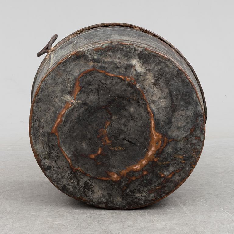 A 19th century copper cauldron.