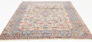 A carpet, Kerman, ca 323 x 213 cm.