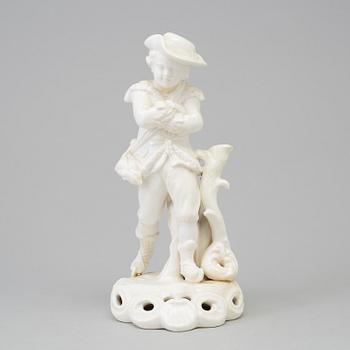 A English porcelain figurine, with a Derby-like mark, early 20th century.