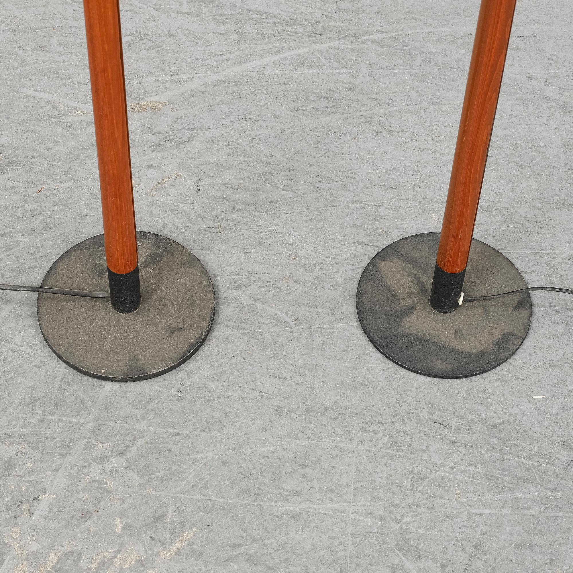 A pair of late 20th Century floor lights.