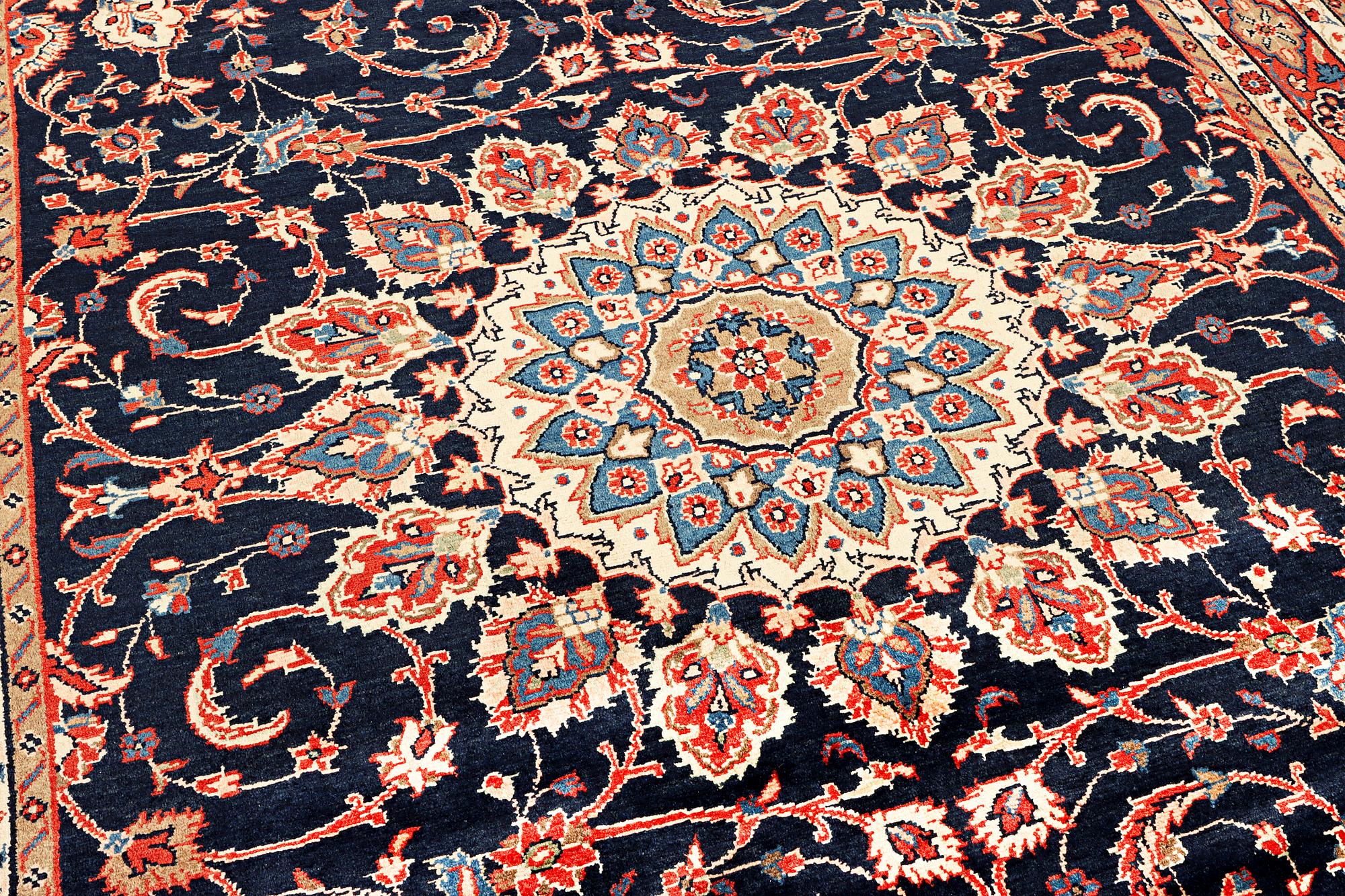 A Hamadan carpet, c. 312 x 216 cm.