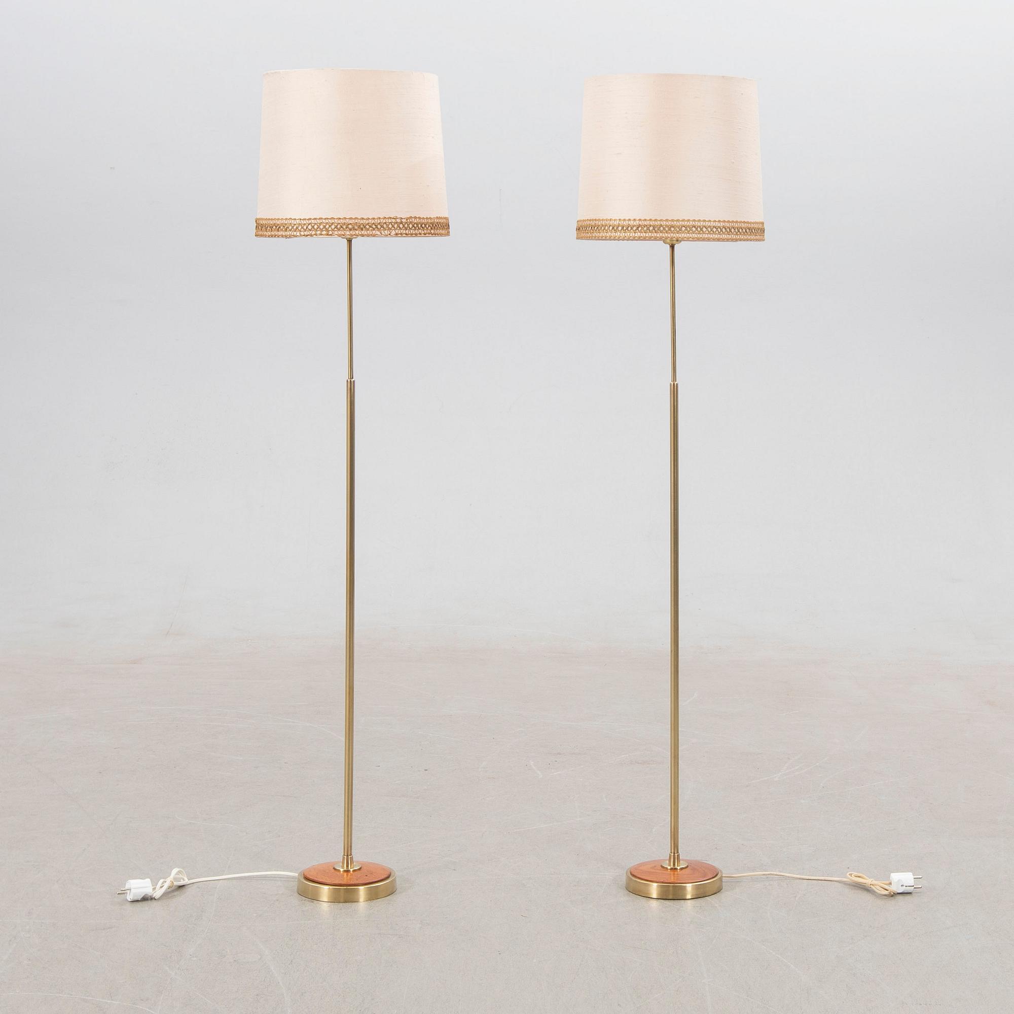 Floor lamps, a pair, mid-20th century.