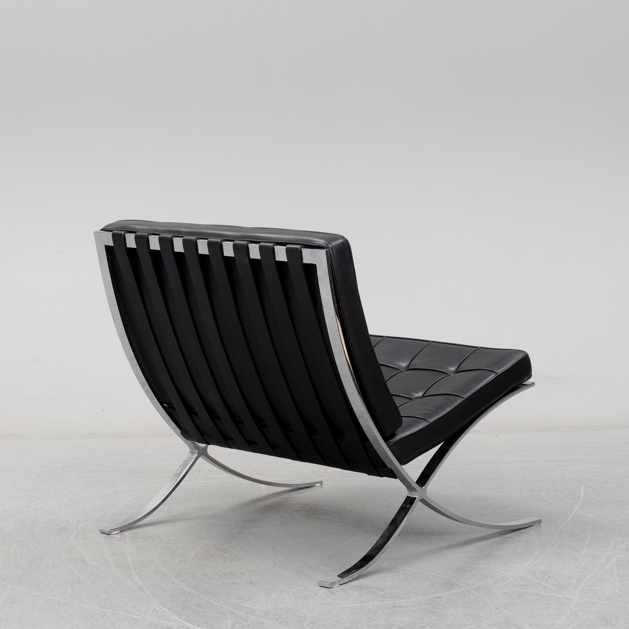 LUDWIG MIES VAN DER ROHE, a 'Barcelona' black leather lounge chair, Knoll Studio.
