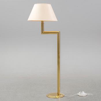 A brass floor light, 1970's.