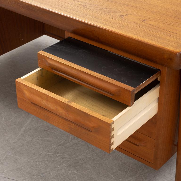 A teak 1950's/60's writing desk.