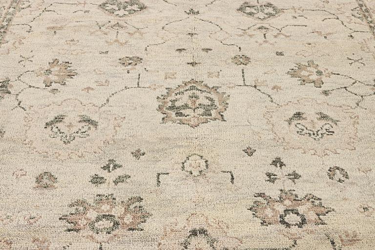 An oriental carpet with Mamluk-design, c. 360 x 280 cm.