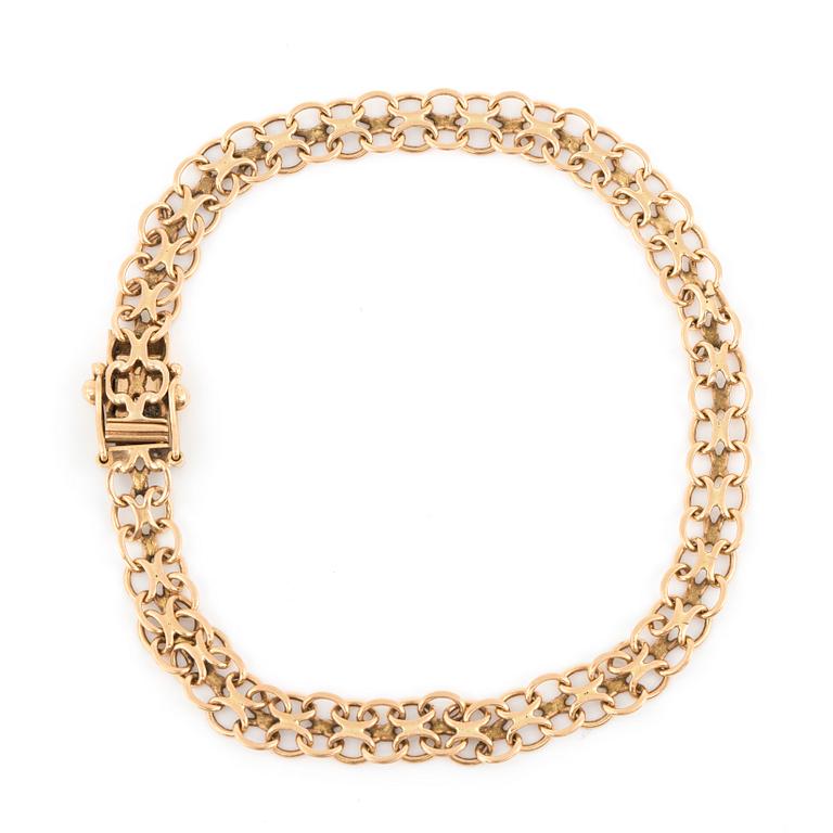 ARMBAND, 'X' länk.