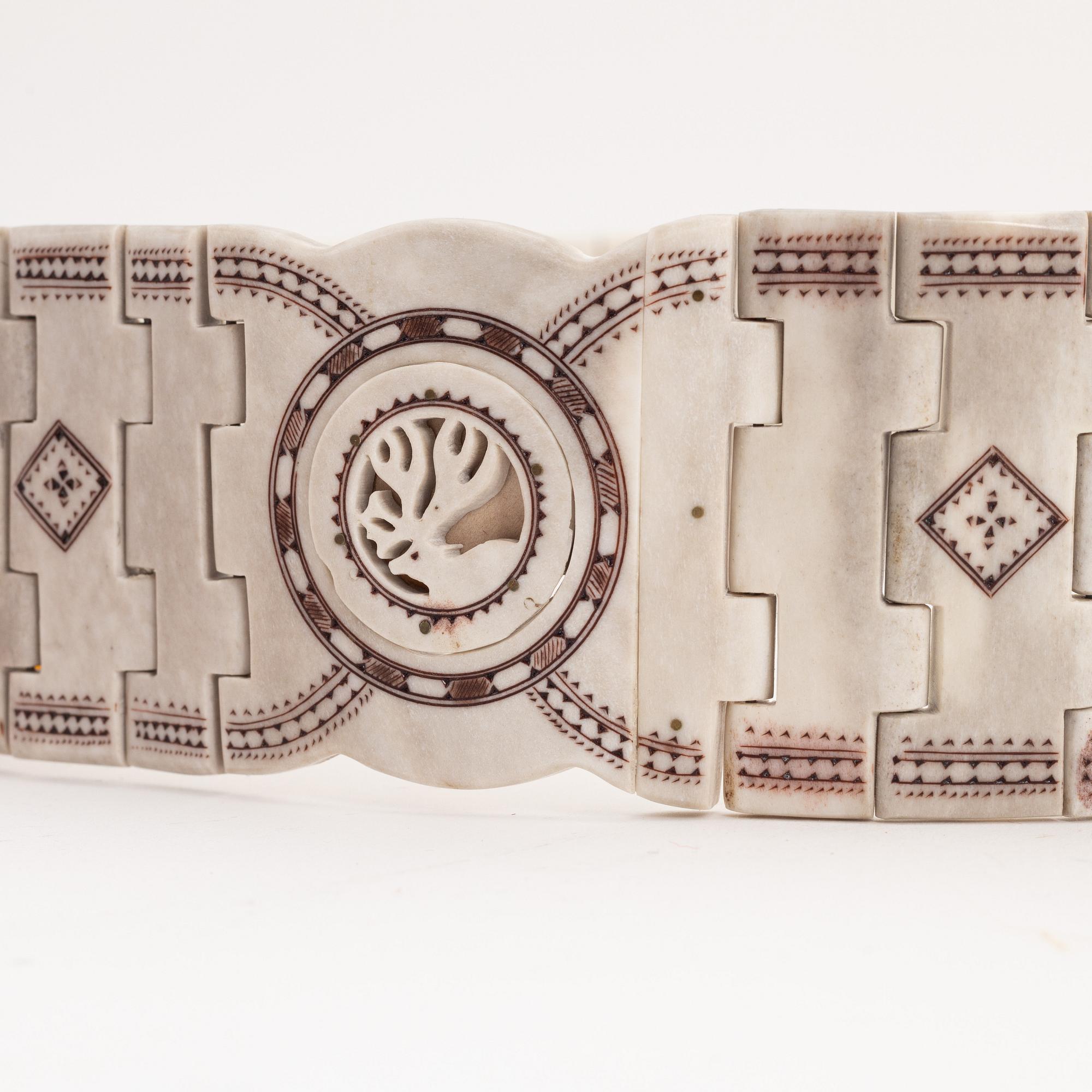 A reindeer horn belt by Gunnar Svonni, signed and dated 1999.